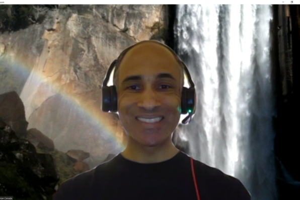 Brian Canada with virtual background of waterfall
