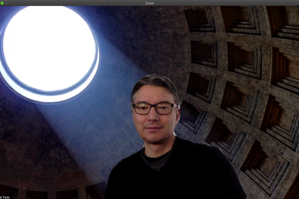 David Tom with virtual background of Parthenon spotlight