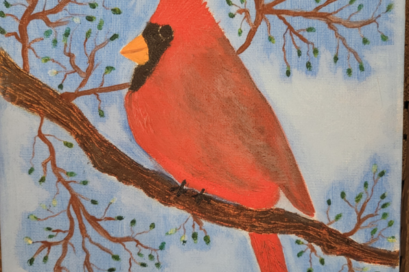 Painting of a cardinal on a tree branch with a light blue winter background