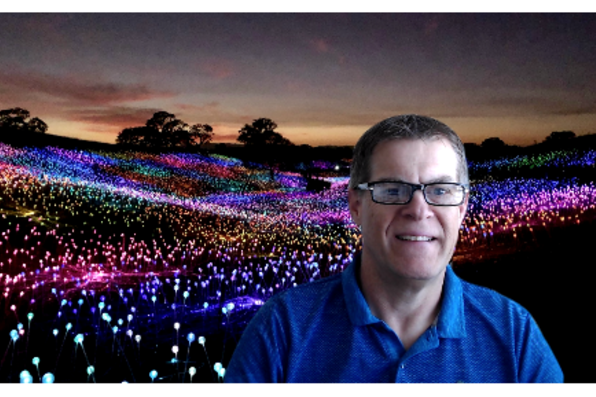 Jeff McMahon with virtual background of field of lights