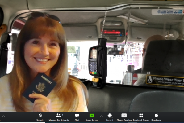 Laurie Spears with virtual background of a London cab