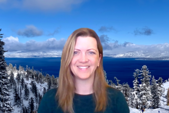 Lisa Boesch with virtual background of a ski resort