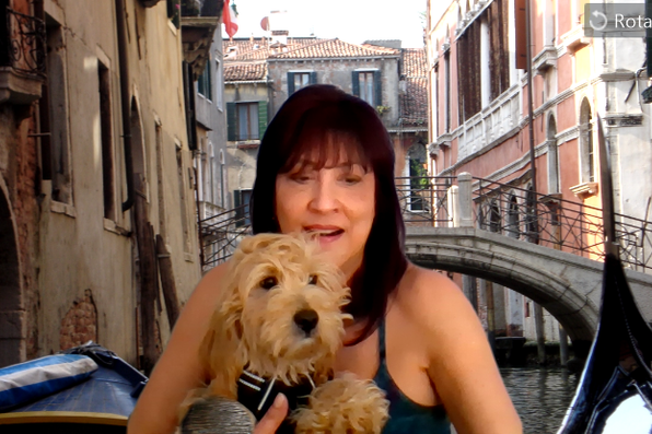 Maria Fraboni with a virtual background of Venice, Italy