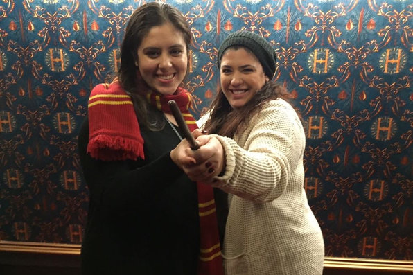 Two women attending harry potter play