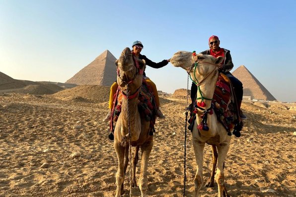 Couple on camels in Egypt