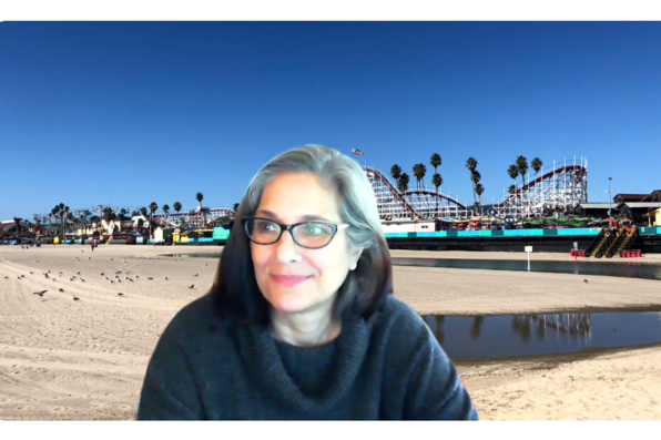 Rebecca Jantzen with a virtual background of the Santa Cruz boardwalk